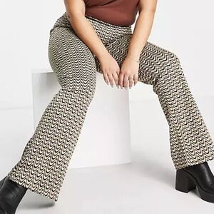 ASOS Curve Jacquard Flare pants in Wavy Stripe
